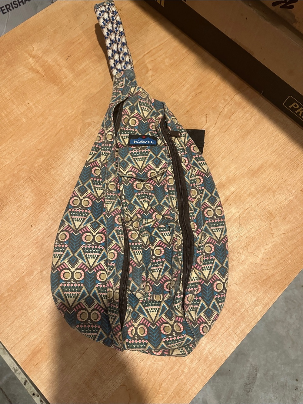 Kavu Teal Multicolor Geometric Rope Sling Bag